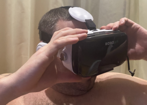 משקפי VR מציאות מדומה לטלפון עם אוזניות מובנות ושלט בלוטוס photo review