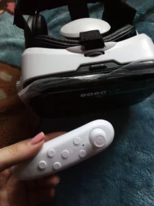 משקפי VR מציאות מדומה לטלפון עם אוזניות מובנות ושלט בלוטוס photo review